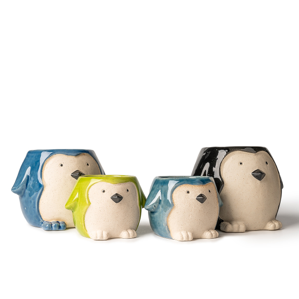 Керамички свећњаци у облику пингвина: дивна и пријатна уметност светлости и сенке